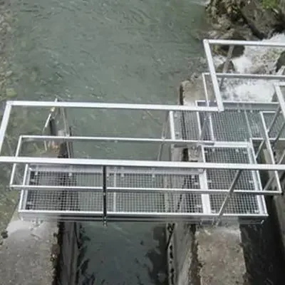 Steel grating footbridge